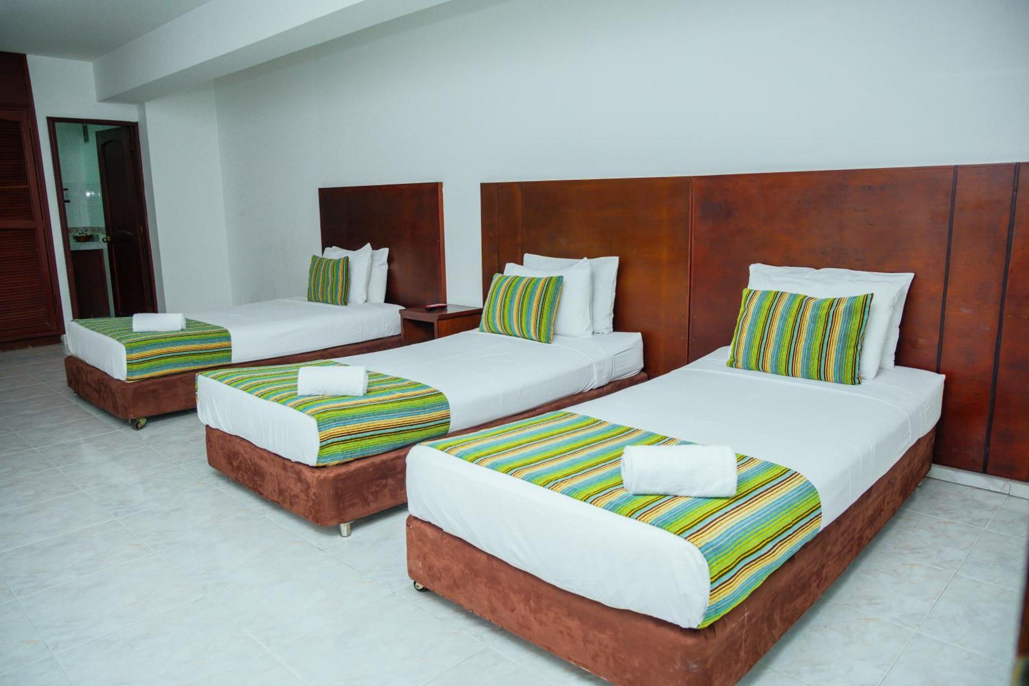 Tama Hotel Granada Real Cali Bagian luar foto