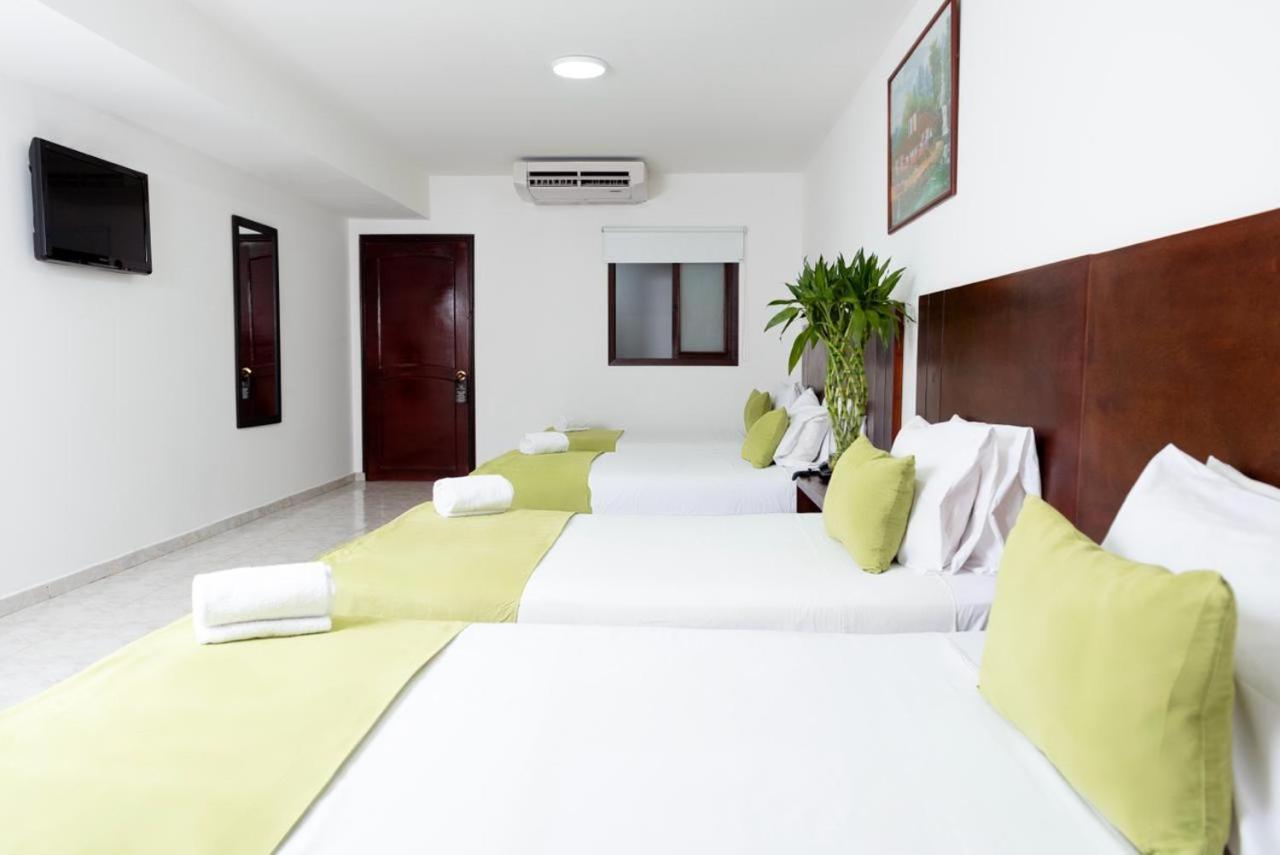 Tama Hotel Granada Real Cali Bagian luar foto