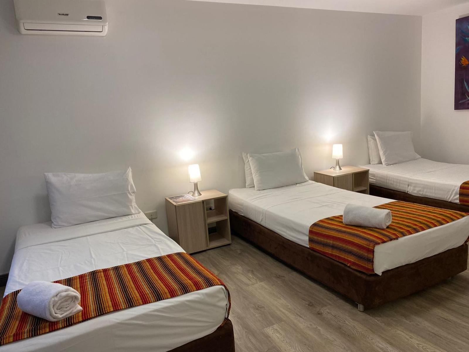Tama Hotel Granada Real Cali Bagian luar foto